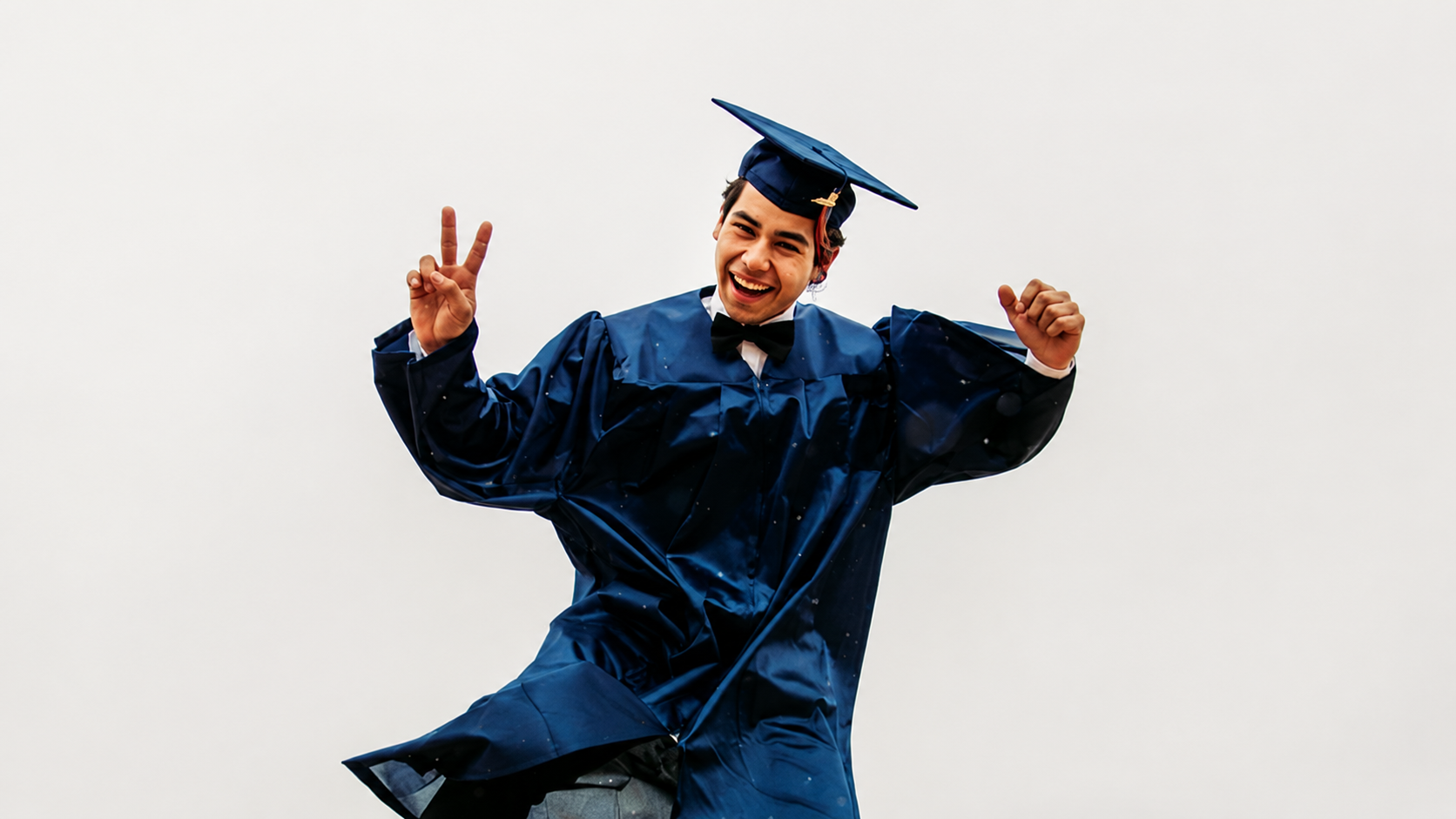 Trained graduate celebrating